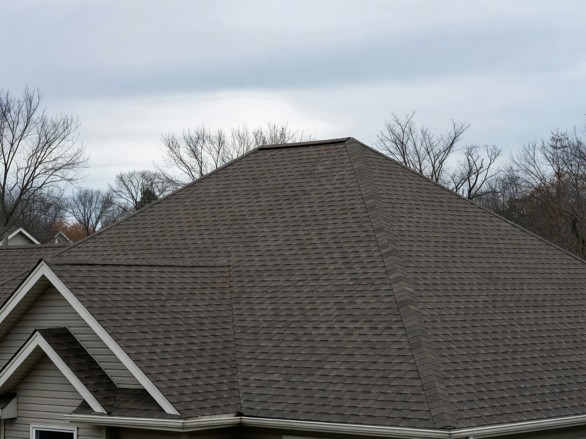 Canadian residential home with pitched asphalt roof